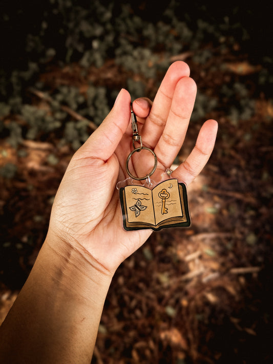 Enchanted Book Keychain — Brass Story Charm for Book Lovers  image 0